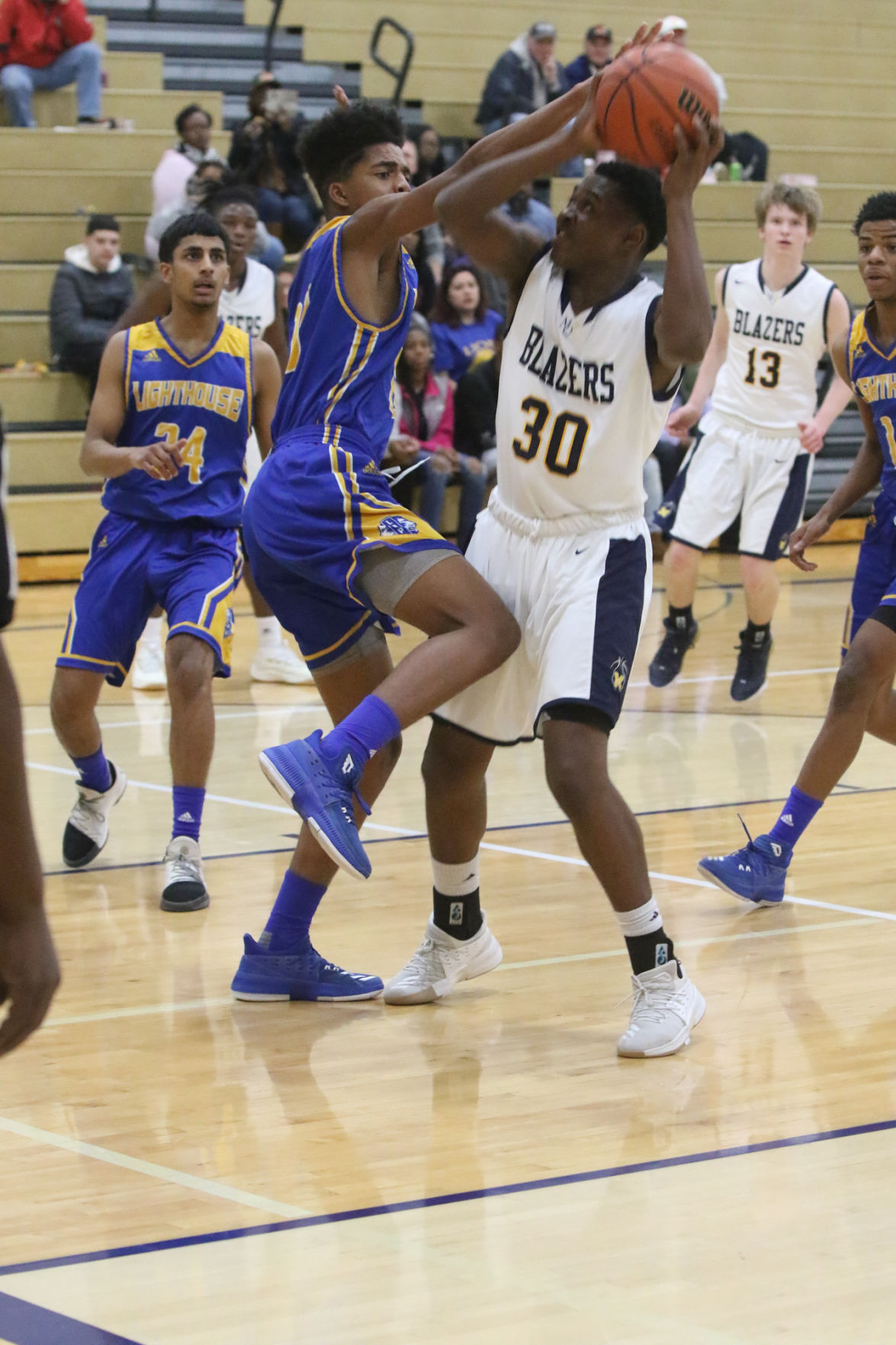 Gallery: Lighthouse at Marquette Catholic boys basketball